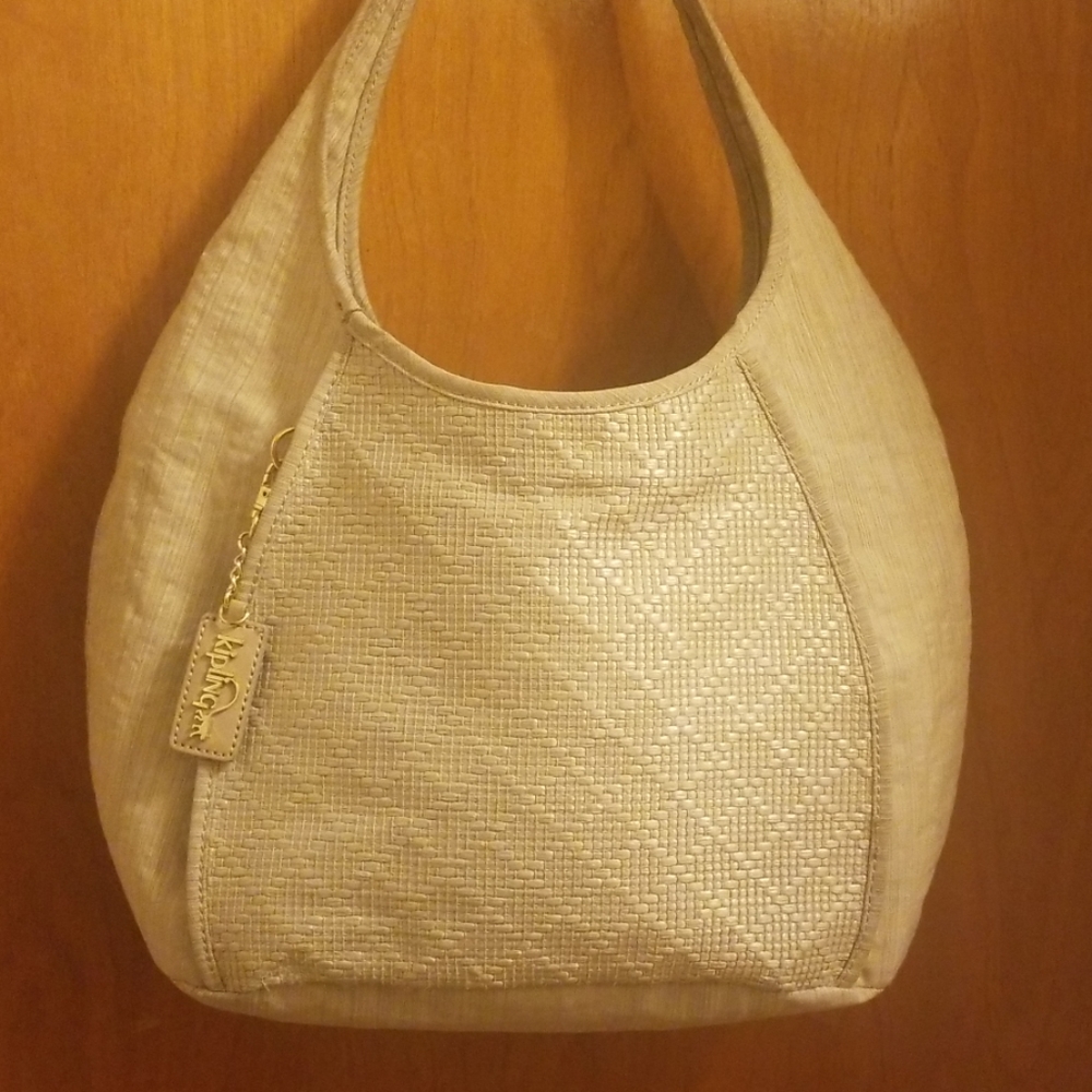 Kipling hobo purse. Tan with basketweave detail.